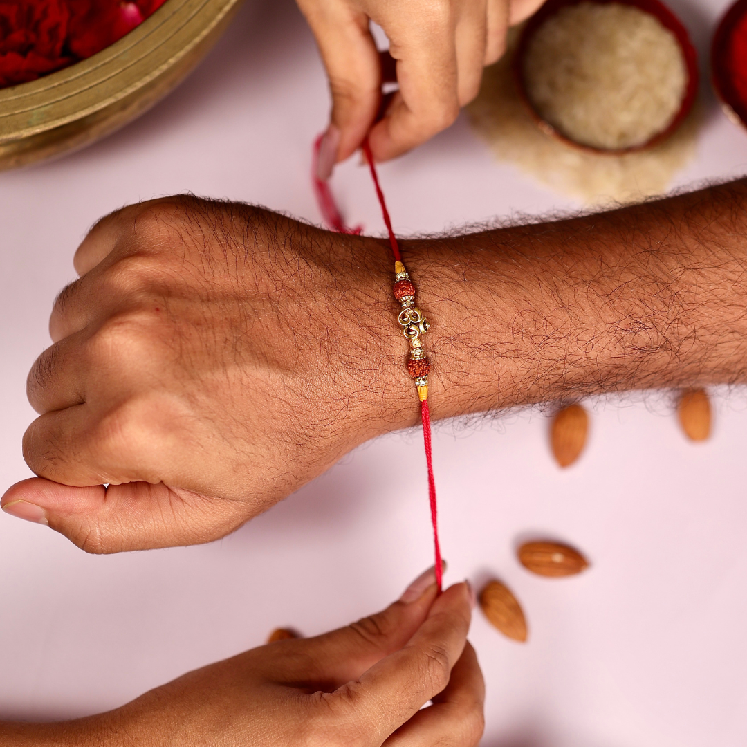 TYOHAAR Om Rakhi Bhaiya and Bhabhi Set